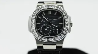 Foto 1 di 11: Patek Philippe Nautilus - Riserva oro bianco brillanti